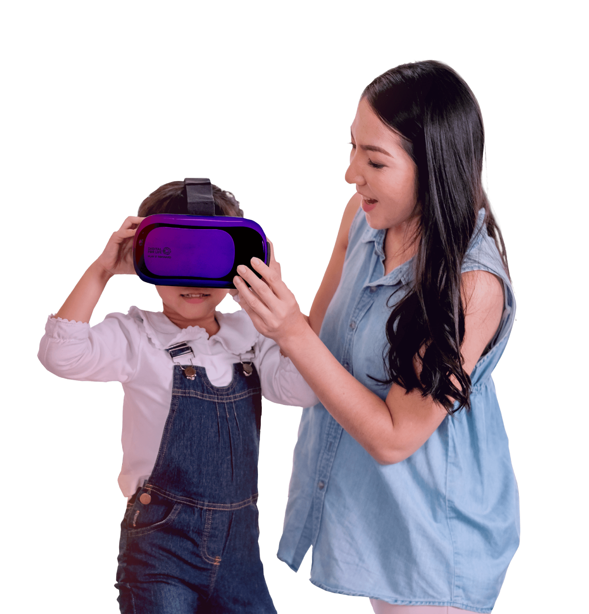 A mother helping her child wear a VR headset
