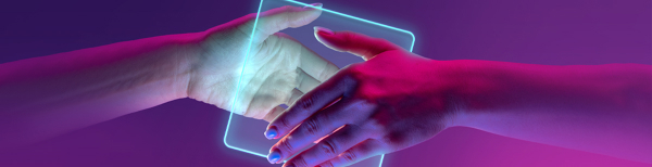 handshake between two persons with a glowing tech cube