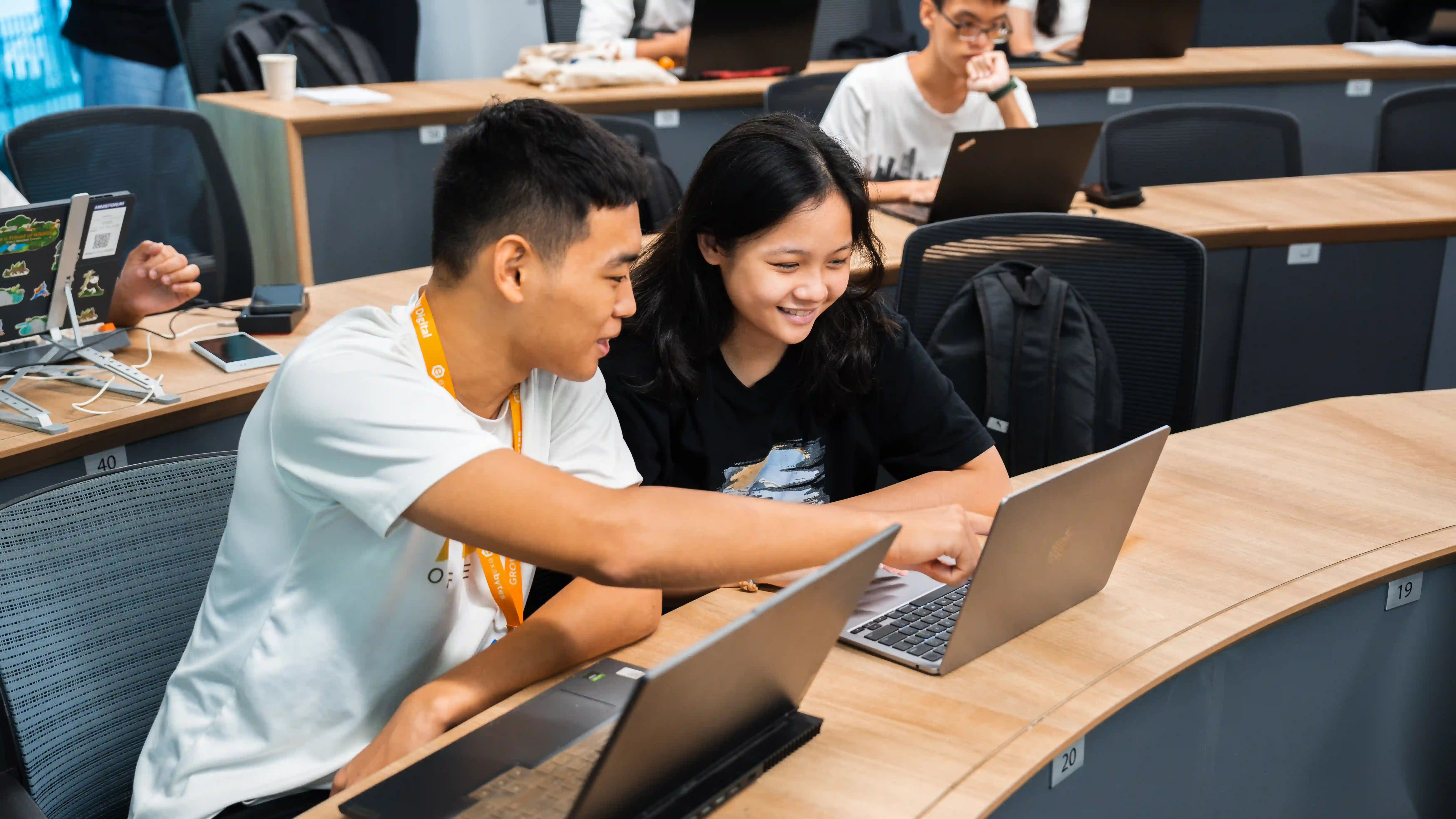 TechCamp participant Crystal beamed with joy as she fully immersed herself in the excitement of coding during the workshop