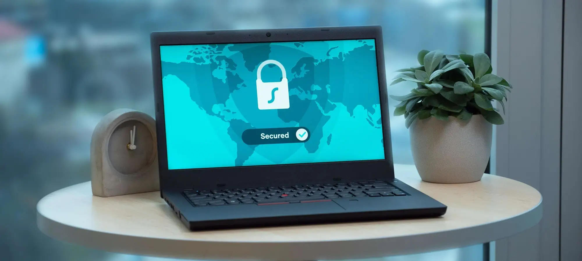 A finger pointing at a lock on a device screen.