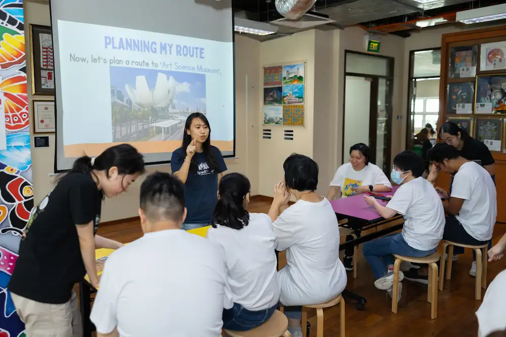 A trainer guided participants on using Google Maps for navigation