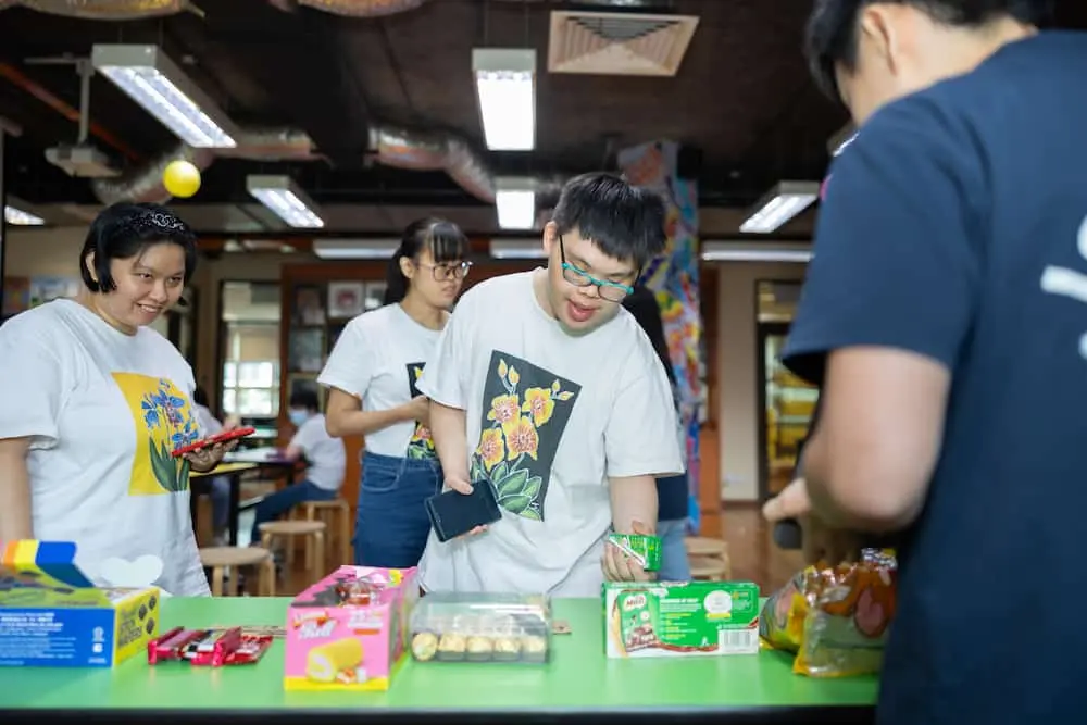 Participants shopped for items during a hands-on session to learn how to use e-payments