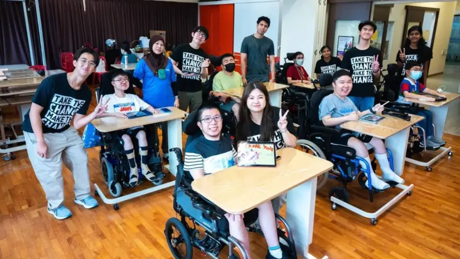 Engaged participants and facilitators at the Digital Arts for All workshop, fostering creativity and empowerment.