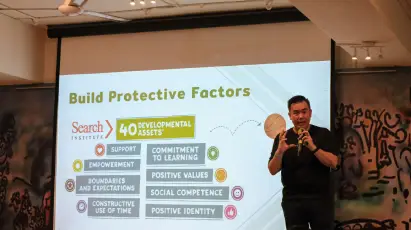 Mr Joshua Liong, principal trainer at Focus on the Family Singapore   engaging participants at a talk on screenwise parenting.  