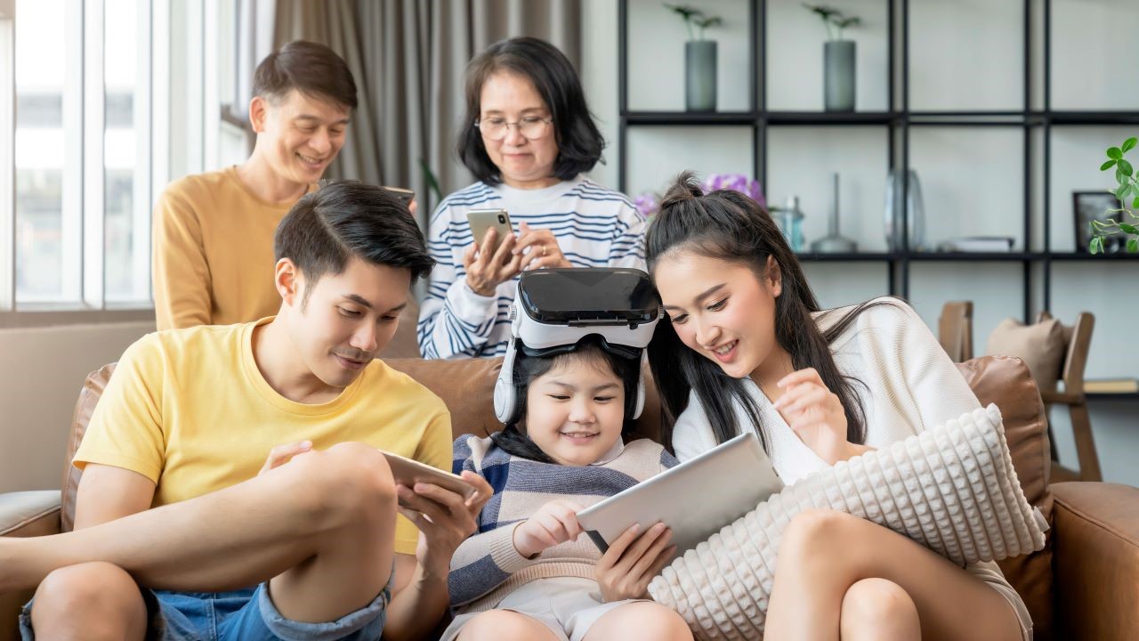 family using smart tech devices