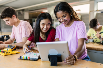 Youths doing hands-on project at digital workshop