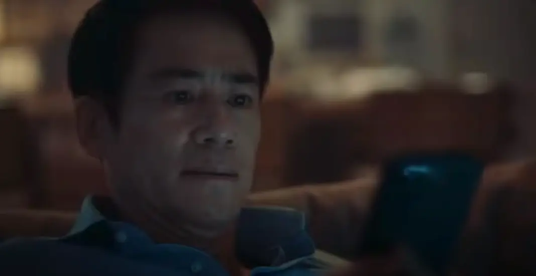 Asian man using mobile